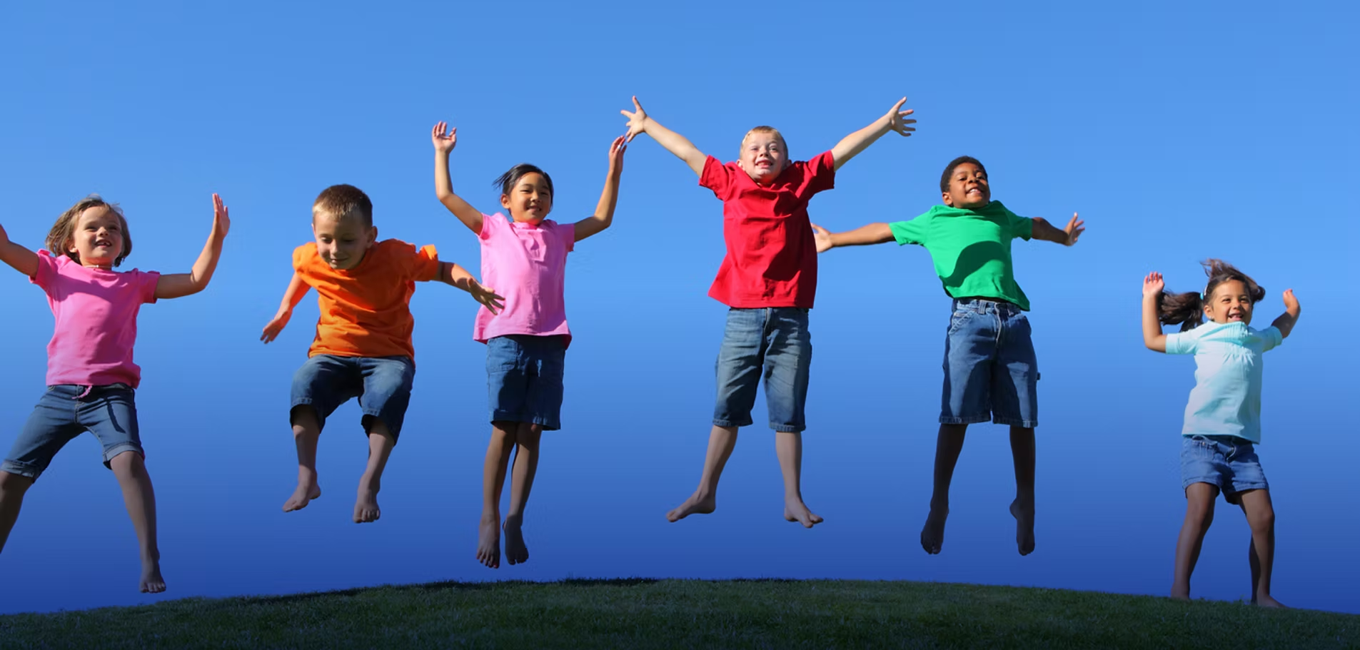 Shine Clubs children playing in a field